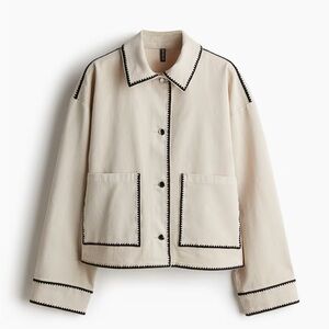 Elegant Cream Jacket with Black Trim